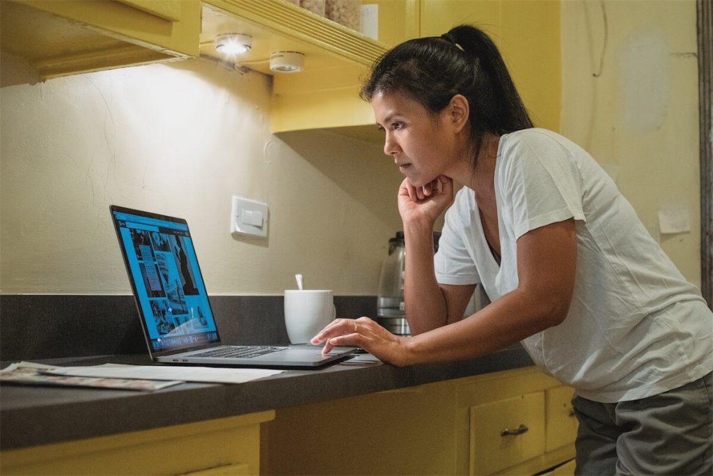 Woman researching on interest offset mortgages in Singapore on her laptop