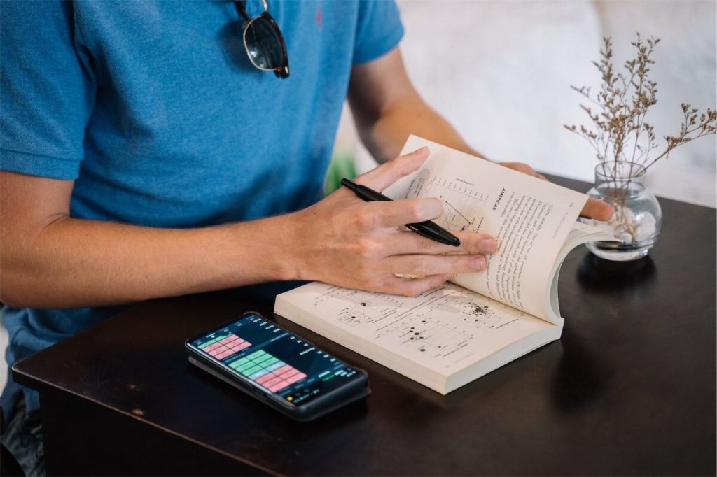 Man preparing for his finances after reconsidering his home loan plans